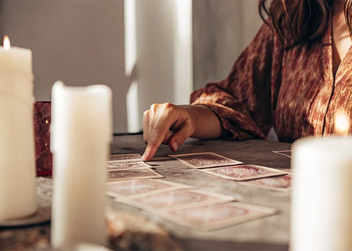 Tarot Cards White Candles A Woman S Hand Pointin 1